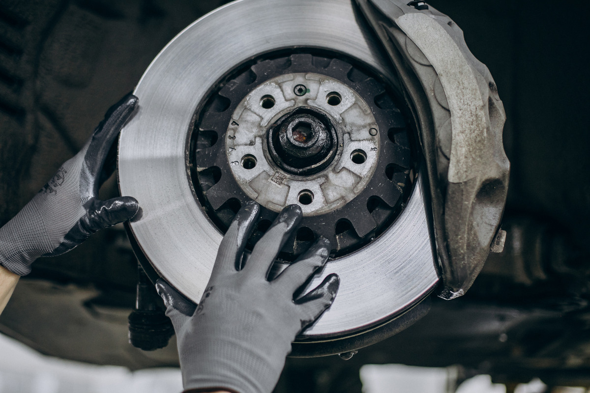 mechanic-changing-brake-discs-car-service (1)