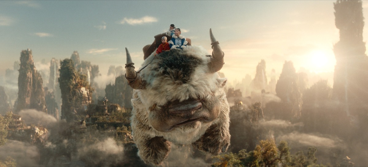 Aang, Katara, and Sokka flying on Appa. Image from Netflix's live-action adaptation of Avatar: The Last Airbender
